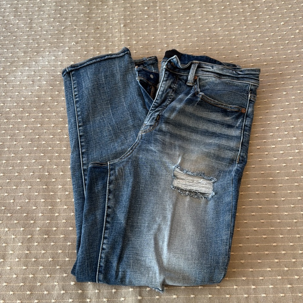 Buckle Black woman’s ankle denim jeans.